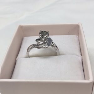 Grey diamond (faux) ring in swirled silver tone setting